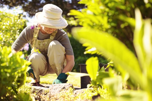 Complaints form on clipboard beside gardening tools