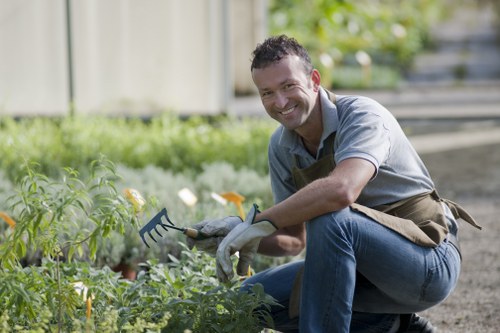 Inspector reviewing garden beds and plantings